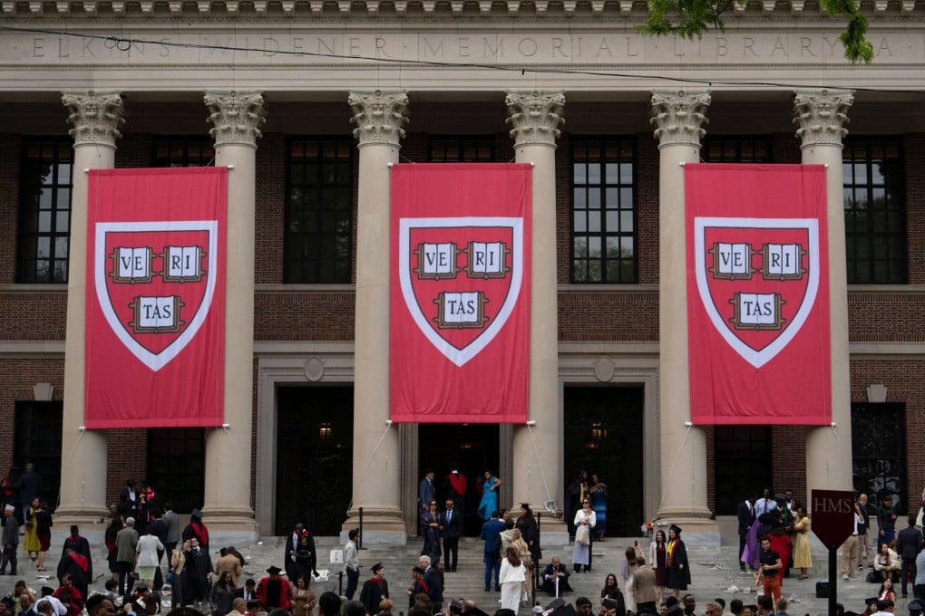 Harvard banners during the university’s 374th commencement ceremonies in Cambridge, Massachusetts, on May 29. US President Donald Trump’s battle with the school obscures the impact restrictions on student visas will have at hundreds of other American colleges. Photo: AFP