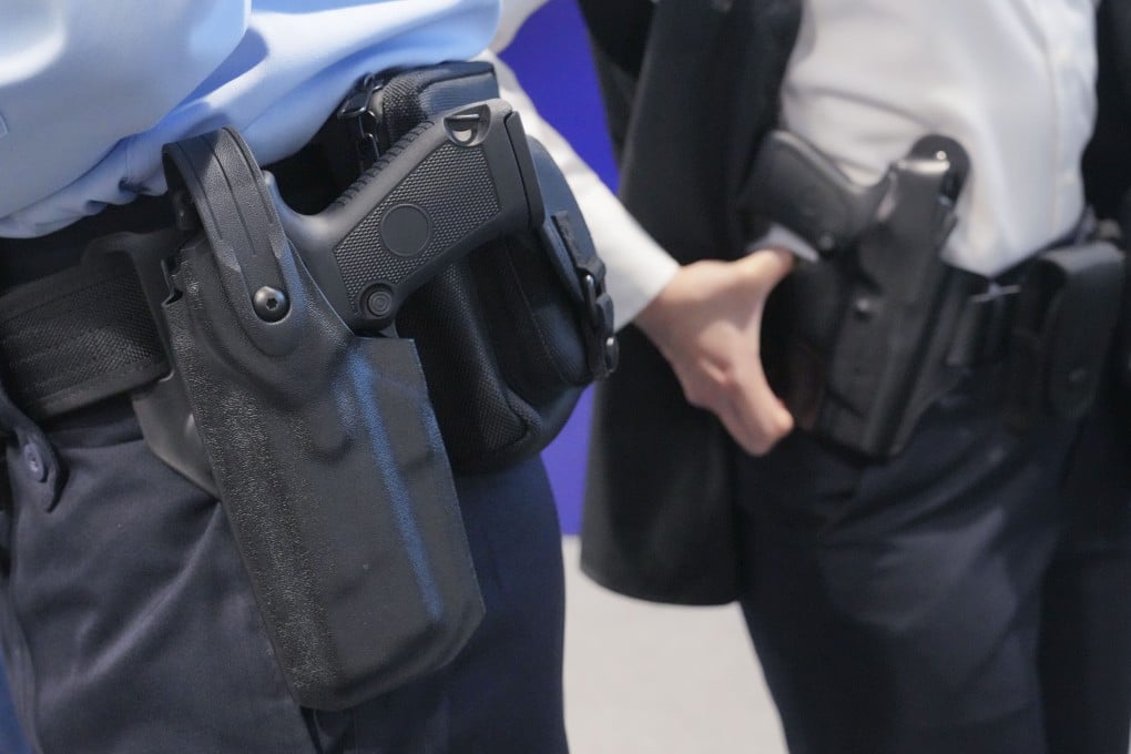 A pistol carried by Hong Kong police. Photo: May Tse