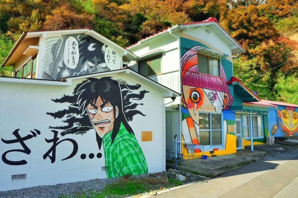 Buildings adorned with manga murals brighten the harbourfront on Takaikamishima, a remote island in Ehime prefecture, Japan. Photo: Kamijima Town Tourism Office