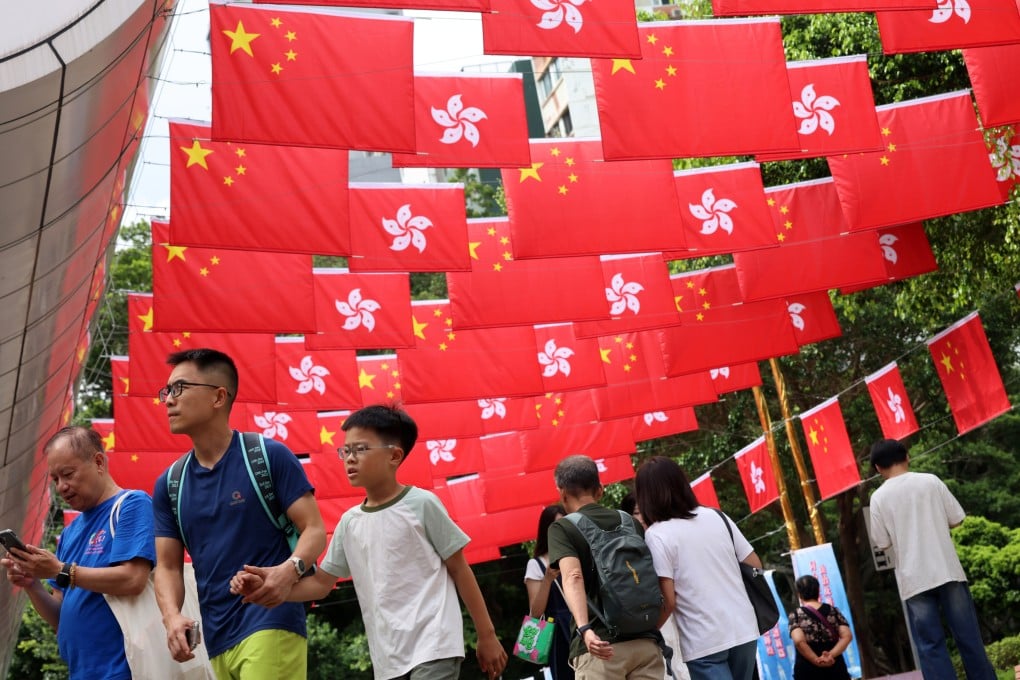 Park Lane in Tsim Sha Tsui on Monday. The July 1 celebrations will begin with a flag-raising ceremony at Golden Bauhinia Square in the morning, with city leader John Lee to speak at a reception afterwards. Photo: Jelly Tse