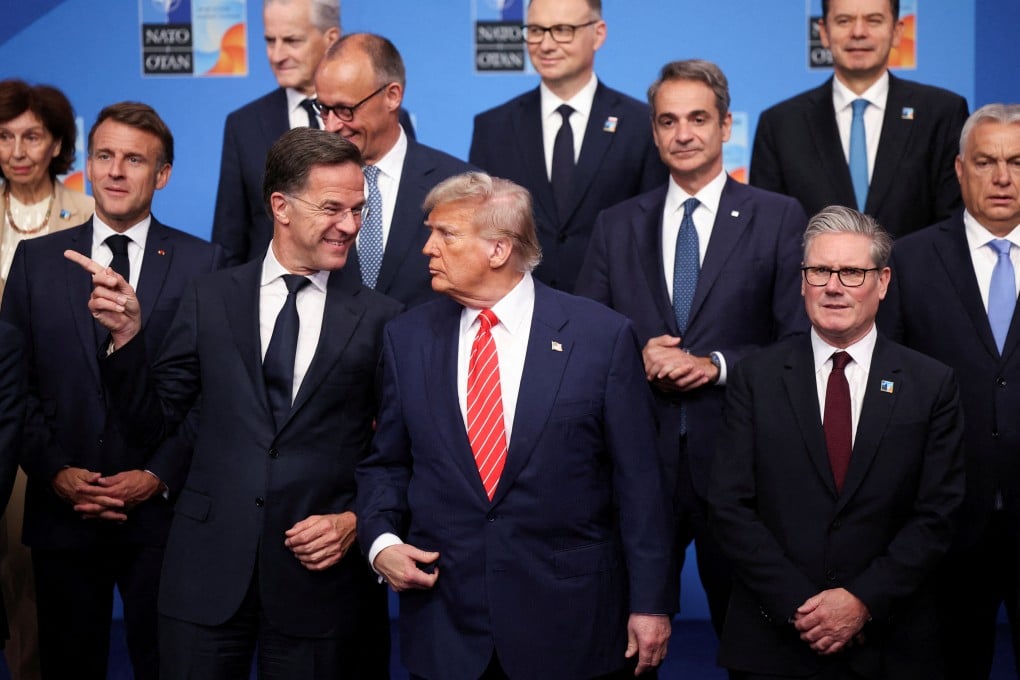 Nato Secretary General Mark Rutte and US President Donald Trump posing for photos with other Nato leaders during the summit in The Hague, Netherlands, on June 25. Photo: Reuters