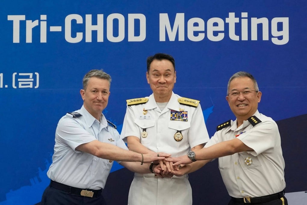 (From left) US Chairman of the Joint Chiefs of Staff Air Force General Dan Caine, Admiral Kim Myung-soo, chairman of South Korea’s Joint Chiefs of Staff, and General Yoshihide Yoshida, Chief of Staff, Joint Staff of Japan’s Self Defense Forces, during the Trilateral Chiefs of Defense meeting in Seoul on Friday. Photo: Pool/AFP