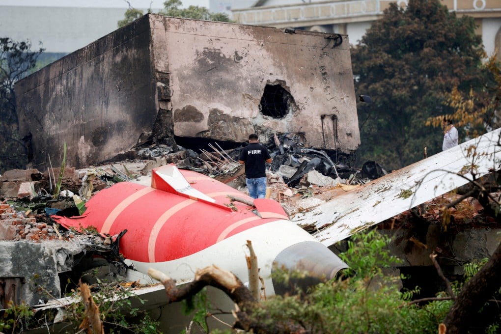 A firefighter stands next to the crashed Air India Boeing 787-8 Dreamliner aircraft, in Ahmedabad, India, on June 13. A preliminary report has found that fuel supply to the aircraft’s engines was abruptly cut off just after take-off on June 12. Photo: Reuters