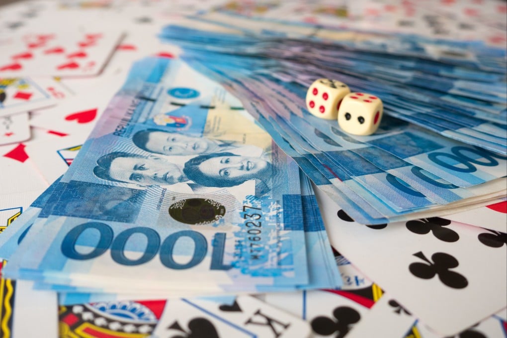 Philippine pesos in a casino. Revenue from Pogo operations peaked at US$116.4 million in 2018. Photo: Shutterstock