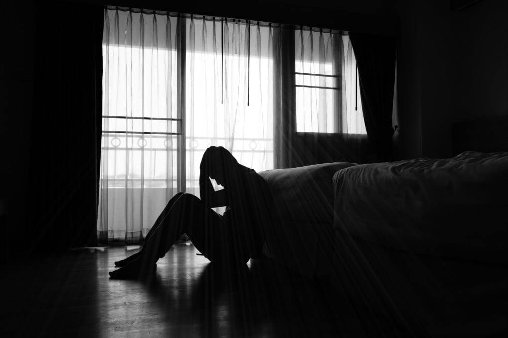 Silhouette of depressed man in a room. Photo: Getty Images