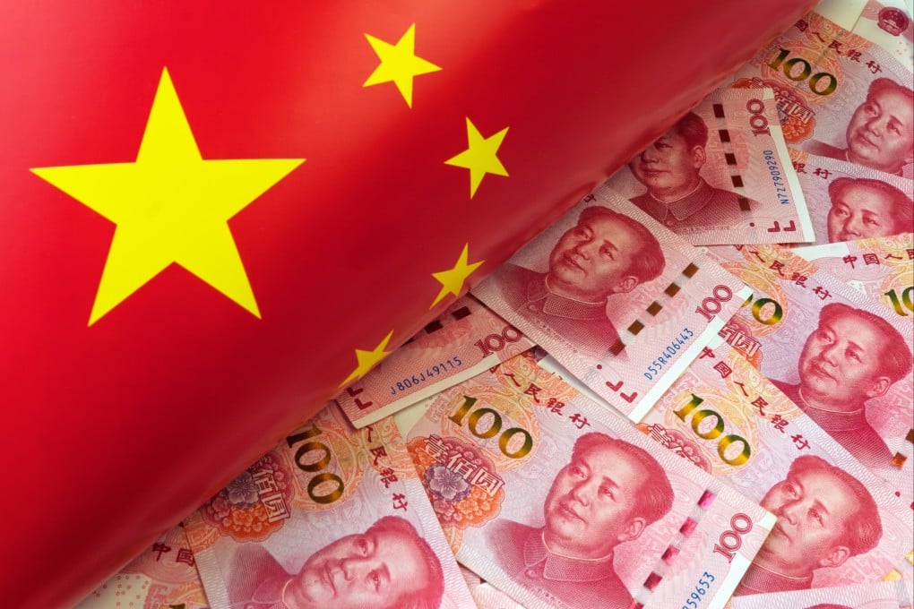 One hundred Chinese yuan bill with a flag of China. Photo: Shutterstock
