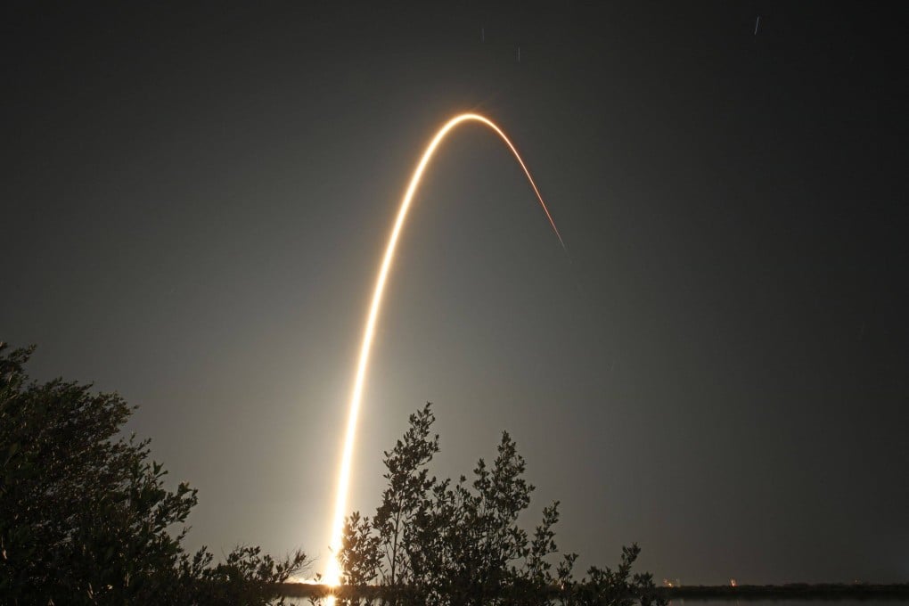 A SpaceX Falcon 9 rocket streaks towards space after lifting off in February. The US company was the first to use drone ships to recover reusable rocket boosters, a technology that China is now testing. Photo: AFP