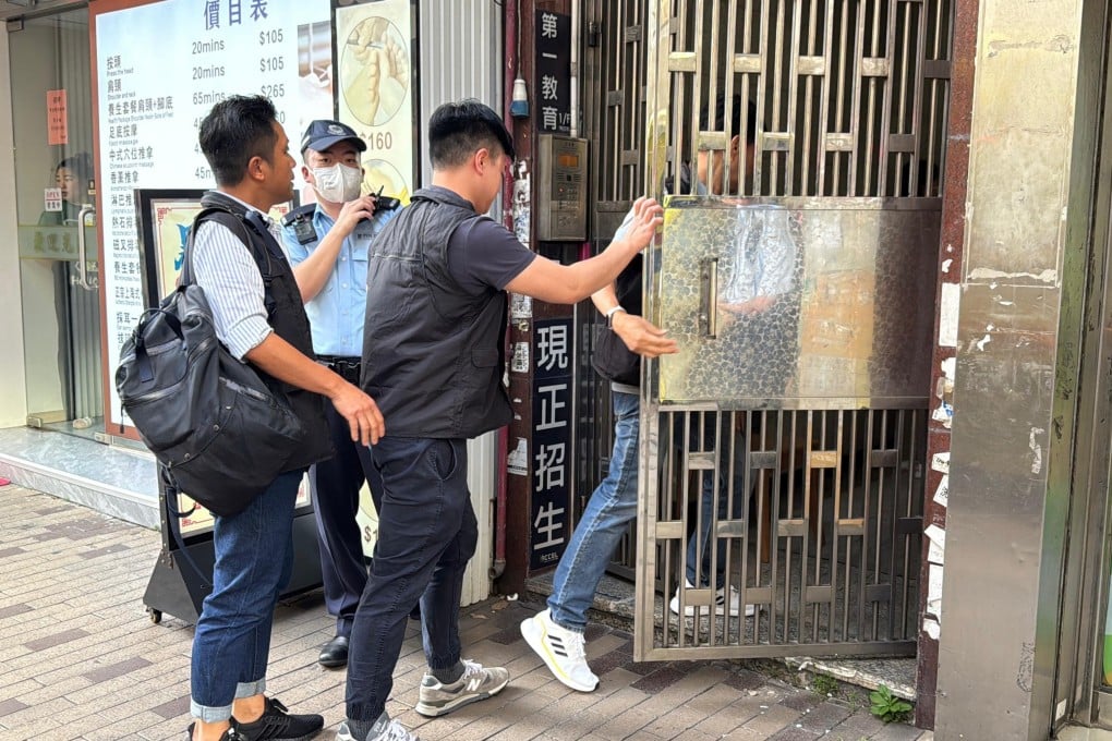Police investigators enter the building where the bodies were found on Monday. Photo: Handout