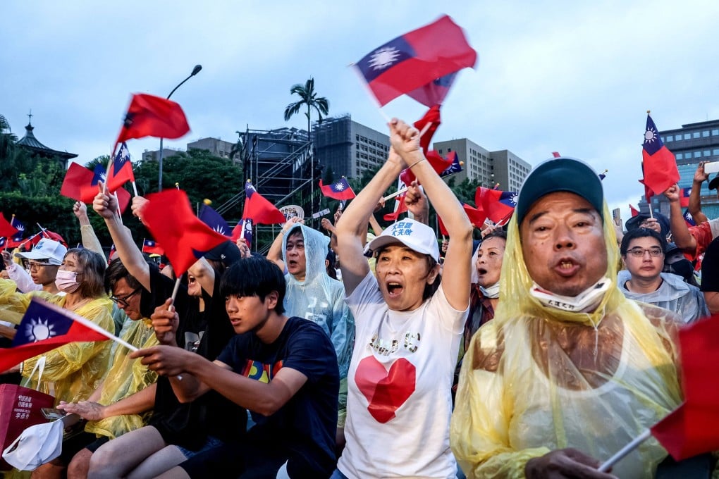 Supporters of Taiwan’s main opposition party Kuomintang rally against the recall vote, in Taipei on July 25. Photo: AFP