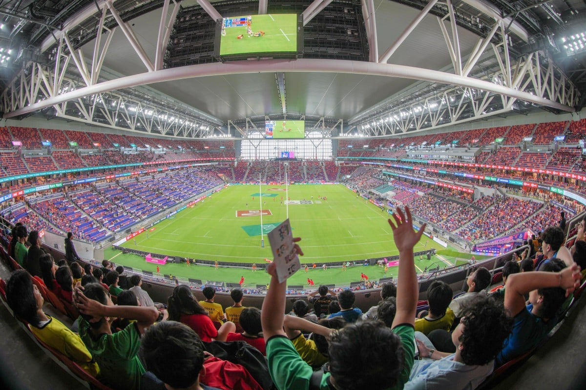 Fans react during the match between Great Britain and Kenya on the first day of the Hong Kong Sevens at Kai Tak Stadium. Photo: Eugene Lee
