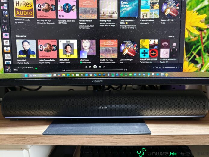 ALT標籤：電腦屏幕顯示音樂和影片平台界面.