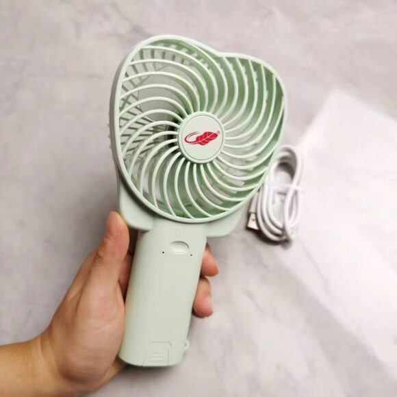 迷你手持風扇,便攜設計適合夏日使用.