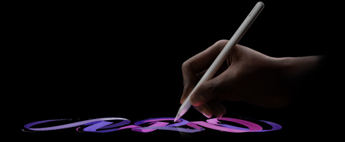 手持Apple Pencil在iPad上繪畫.