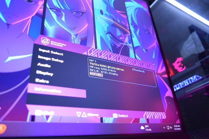 Monitor display settings with gaming interface and neon anime graphics.