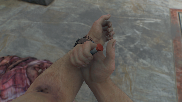 Hands tightly holding a syringe, a red cap visible, over a marble floor background.