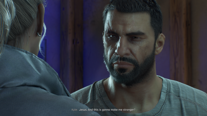 A man with a pensive expression listens intently to another person in a dramatic setting.