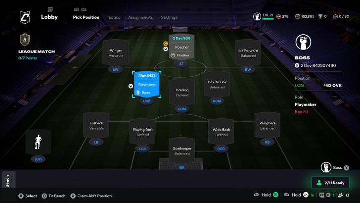 Soccer game tactics screen showing player positions and roles on a virtual field.