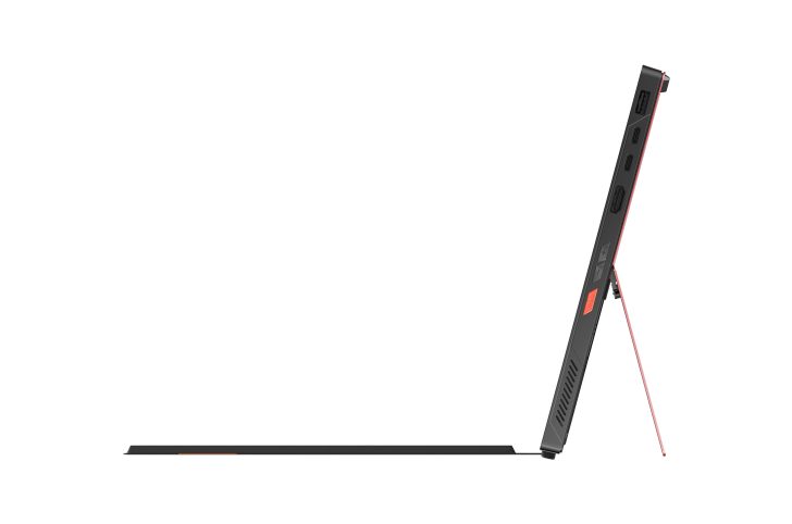 Slim portable device with stand and multiple ports, side view. Ideal for tech enthusiasts and digital work.