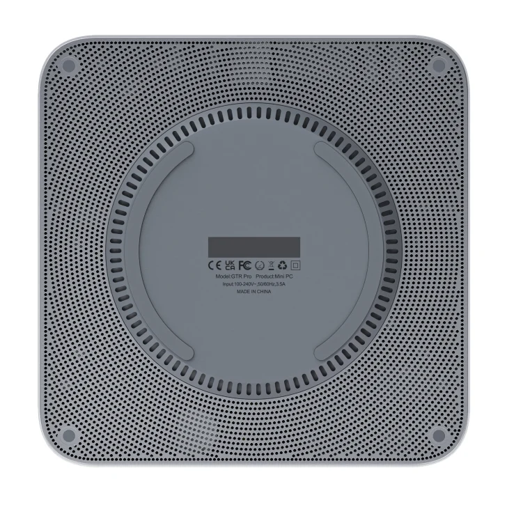 Bottom view of a gray mini PC labeled GTR Pro, showing ventilation design and product details.