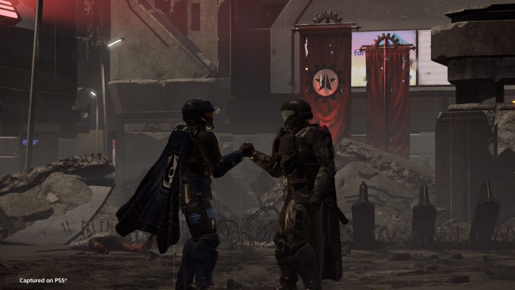 Two armored figures shake hands in a post-apocalyptic scene.