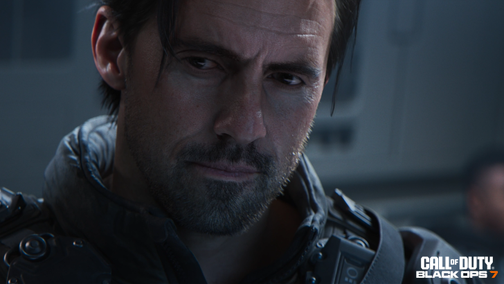 Man in futuristic gear from Call of Duty Black Ops 7 game, intense expression.