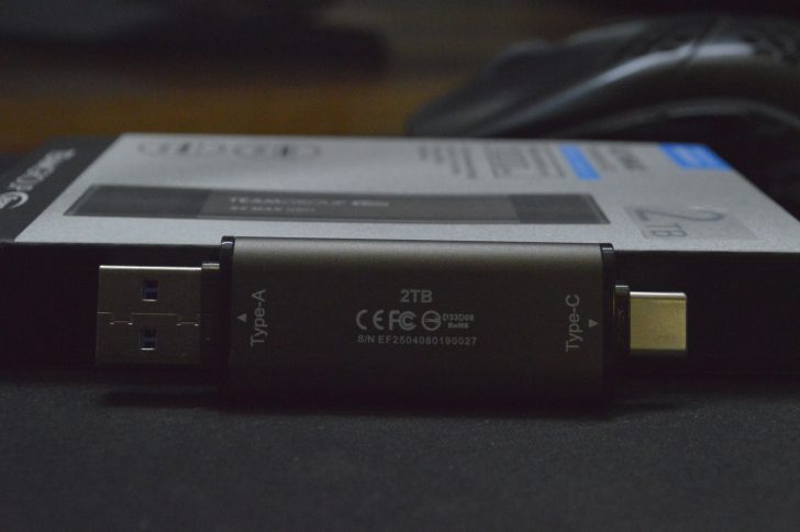 2TB USB drive with Type-A and Type-C connectors on packaging.