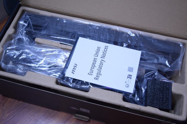 Unboxing MSI product with European Union regulatory notices inside packaging.