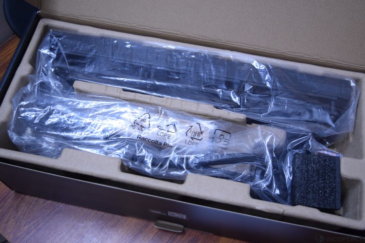Boxed computer components wrapped in plastic for secure packaging and safe transport.