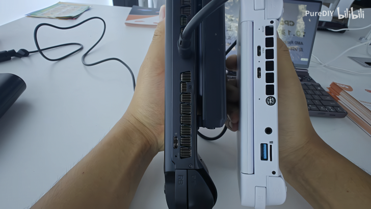 Two laptops compared side-by-side, showcasing ports and design differences.
