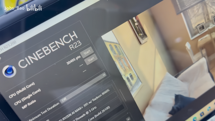 Cinebench R23 benchmark test on screen showing CPU performance results in a cozy room.