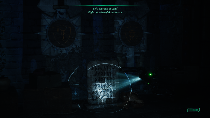 Game screen with text Left: Warden of Grief and Right: Warden of Amazement above emblems, and an Esc BACK option.
