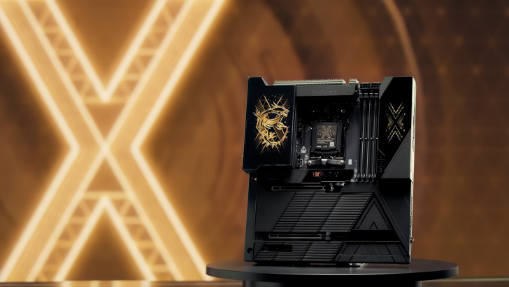 High-end black and gold motherboard with intricate dragon design on a stylish display.