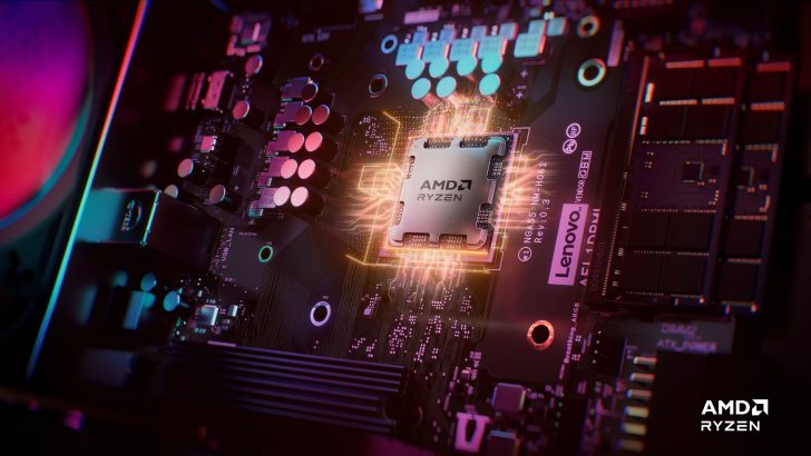 AMD Ryzen processor on a Lenovo motherboard with glowing circuit design.