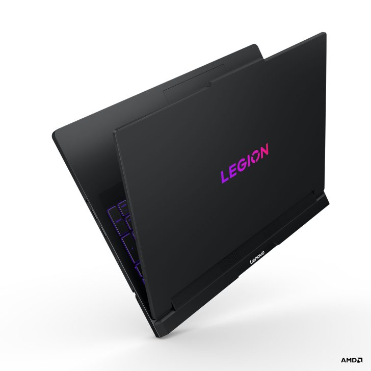 Lenovo Legion laptop with LEGION and Lenovo logos, partially open on a white background; AMD logo visible in the corner.
