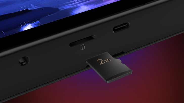 SD card labeled 2 TB partially inserted into a slot on a device with a screen above.