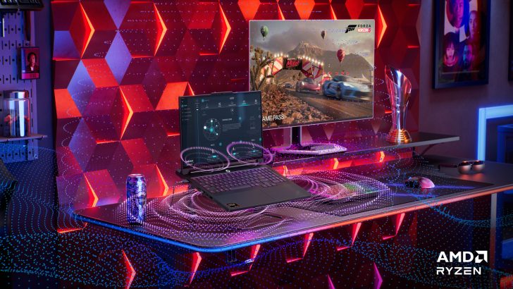 AMD Ryzen laptop and monitor on gaming desk with Forza Horizon 5 displayed, surrounded by RGB lighting and a can of Rockstar.