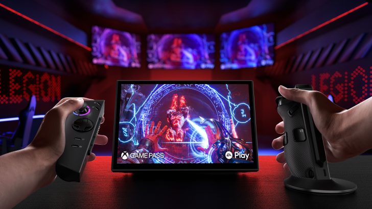 Lenovo Legion gaming setup with handheld controllers beside a screen showing Game Pass and EA Play logos, in a futuristic room.
