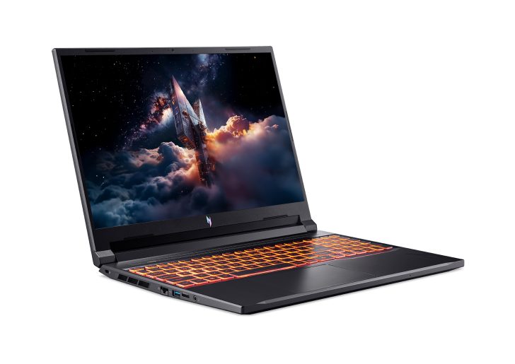 Acer laptop with illuminated keyboard displaying a spaceship scene on the screen.