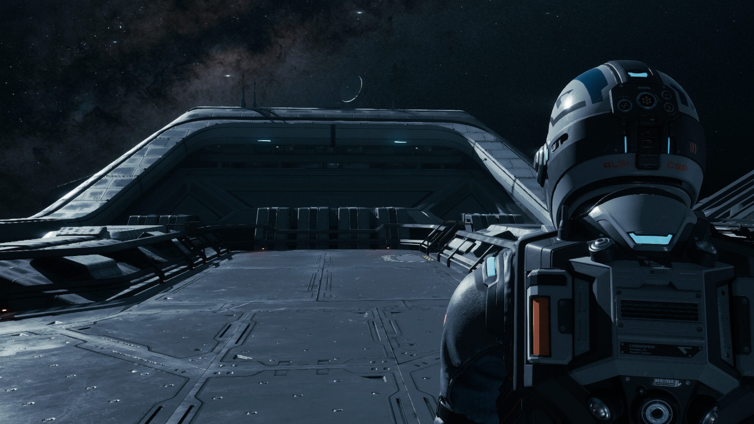 Spacesuited figure labeled RL: CSP stares into space on a futuristic platform under a starry sky.