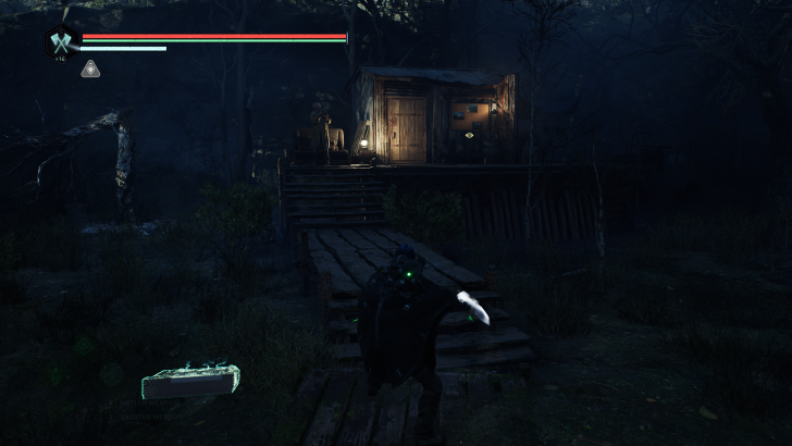 Game interface with health bars and controls on screen in a dark forest setting by a wooden cabin.