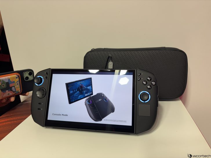 Lenovo Legion Go console displaying Console Mode alongside a carrying case on a table.