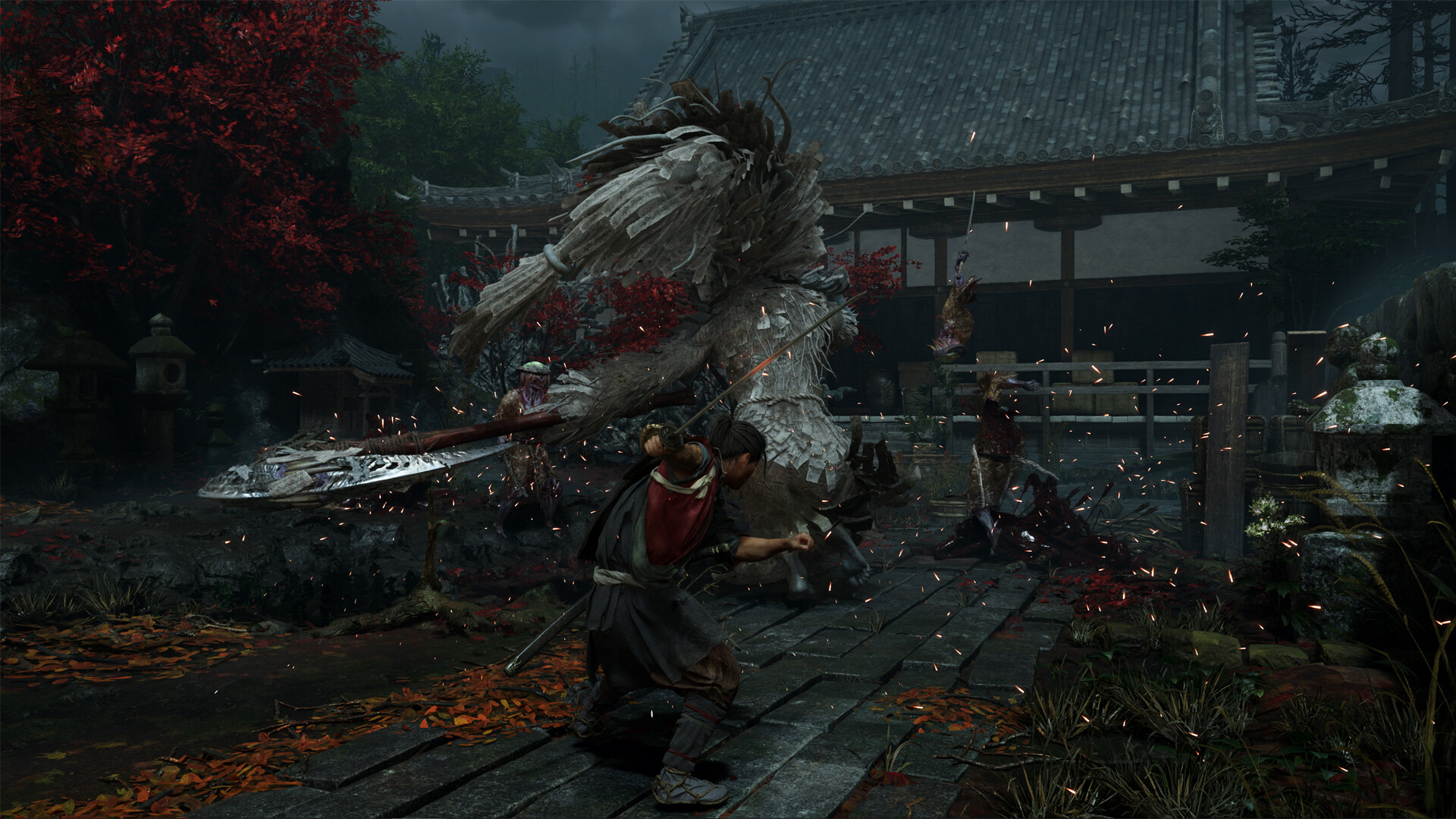 A warrior battles a large creature in a temple setting with red leaves scattered on the ground.