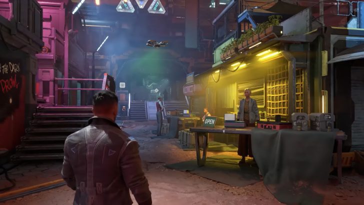 Futuristic marketplace scene with neon lights and a person facing an OPEN sign on a table.