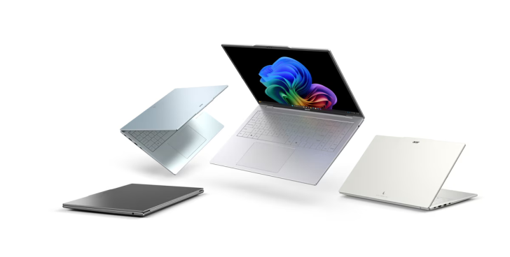 Four Acer Swift X laptops displayed in various positions with one showing a multicolored screen.