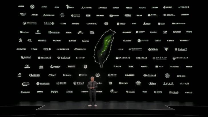 Logos of brands like ASUS, MSI, and Gigabyte are displayed on a black background with a person standing on stage.