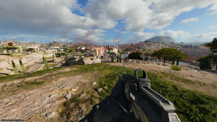 A first-person view in the game Call of Duty: Modern Warfare II shows a player holding a rifle, surveying a village landscape with position markers '4' and '2' visible in the distance.