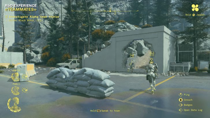 A gameplay scene from 'Hyenas' showing two armored characters exploring a mountainous area with objectives 'Investigate Alpha team status' and 'Gather Black Boxes (1/5).'