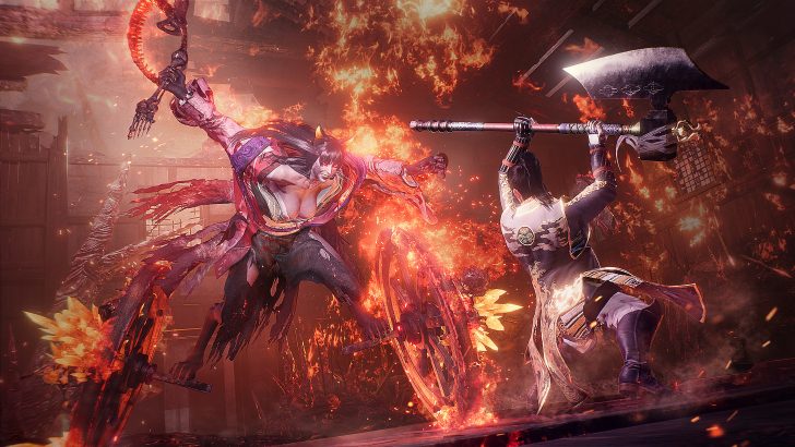 A character in the game 'Nioh 2' battles a large demon-like creature wielding a fiery claw in a burning environment.