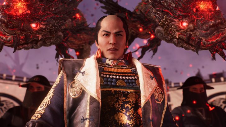 A character in elaborate, traditional Japanese attire stands before two fiery red dragon heads in a video game scene.