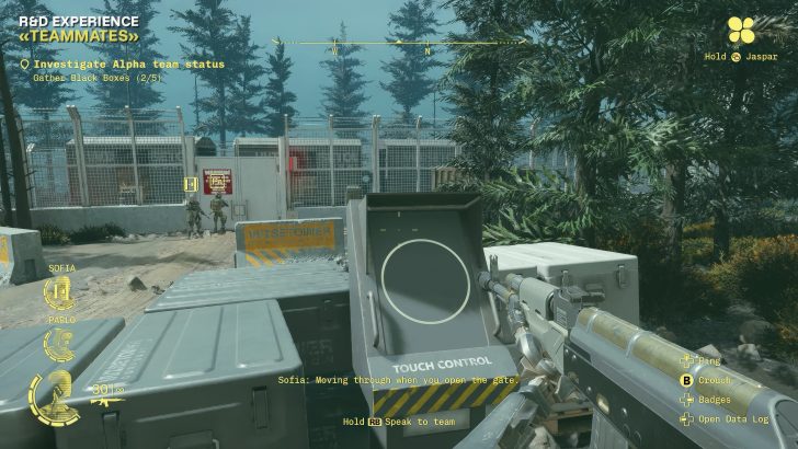 In a game interface titled 'R&D Experience: Teammates,' players see an objective to 'Investigate Alpha team status' near Wisecomber Corporation barricades, with icons for actions like 'Hold RB Speak to team.'